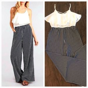 SWEET WANDERER SANDY JUMPSUIT IN IVORY & NAVY BLUE